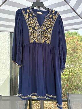 Solitaire Navy Embroidered Dresswith Cream Label and Red Logo